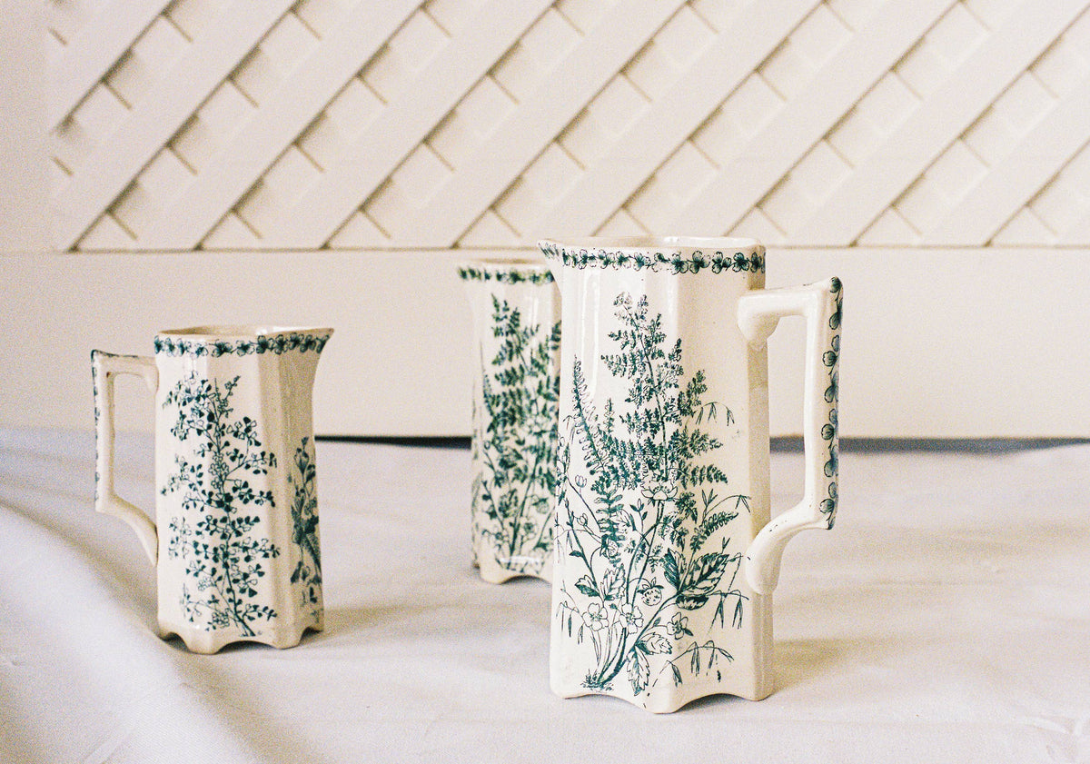 Three Victorian botanical transferware pitchers
