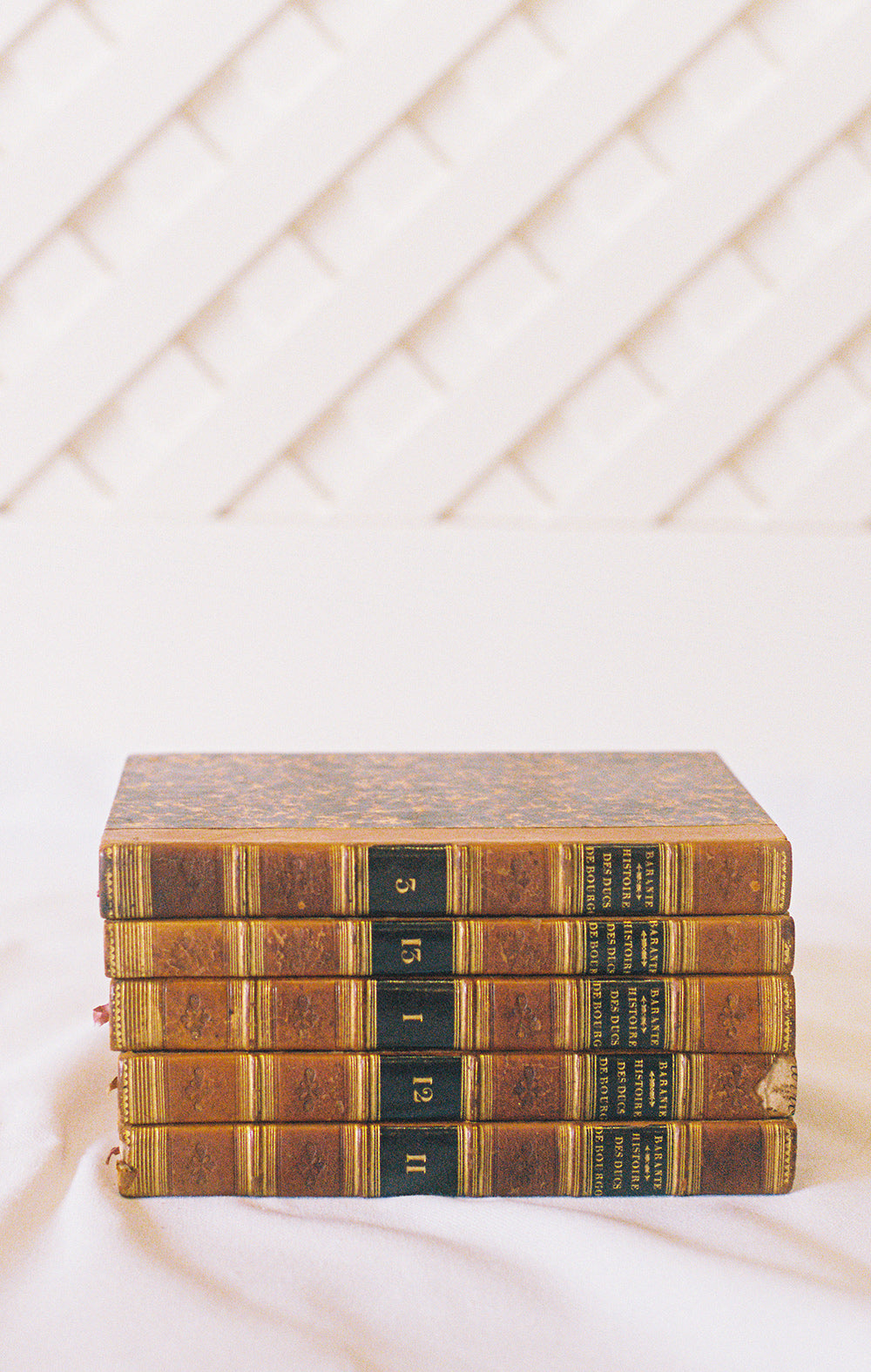 Five leather bound volumes of Barante, Histoire des Ducs de Bourgogne, with gilt spines and marbled boards