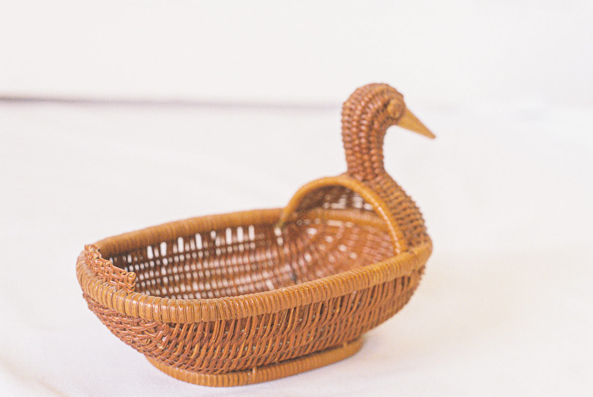 Wicker duck trinket basket, from behind