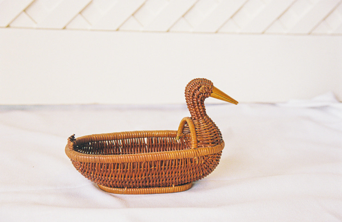 Wicker duck trinket basket, from the side