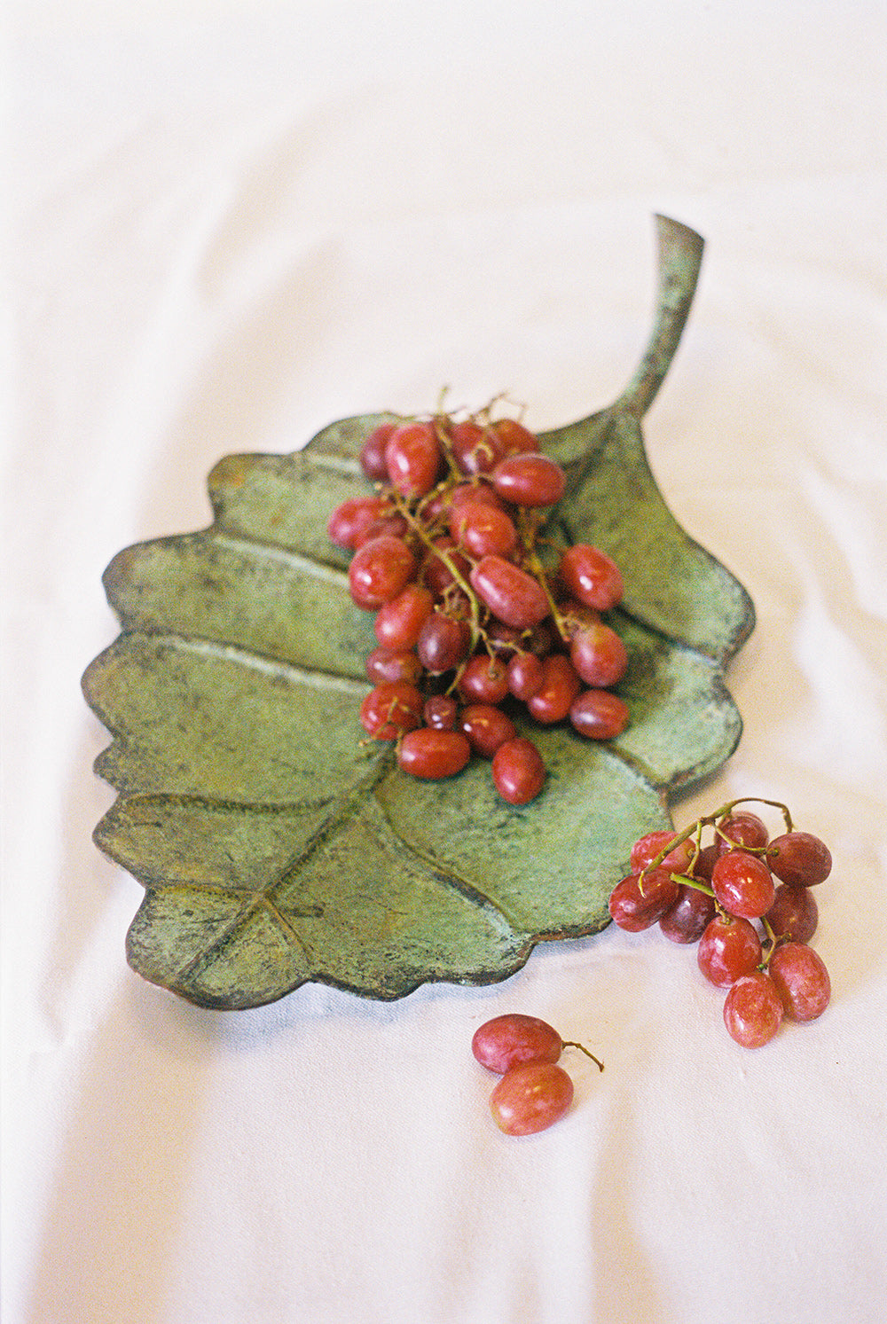 Leaf shaped serving dish with a verdigris finish