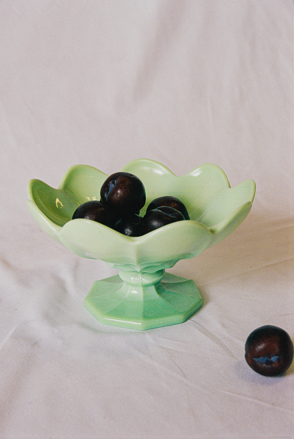 Jadeite glass pedestal bowl