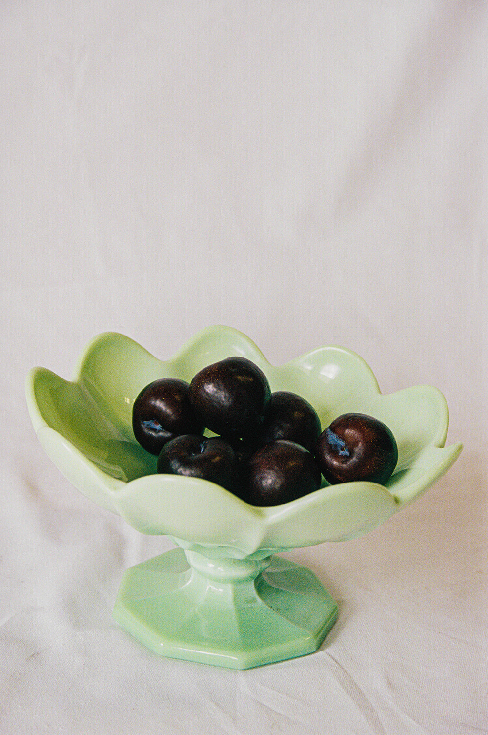Jadeite glass pedestal bowl
