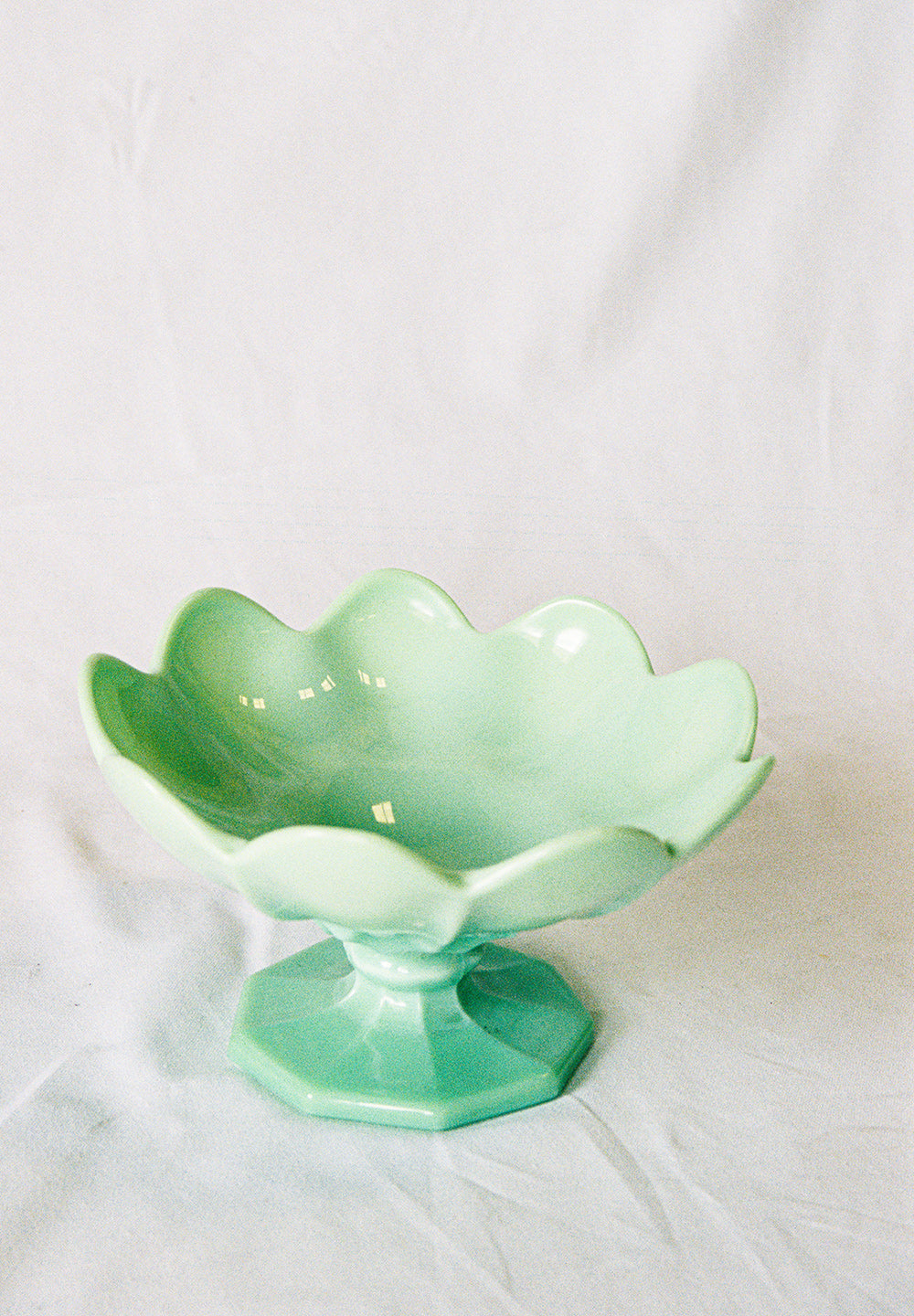 Jadeite glass pedestal bowl, upright