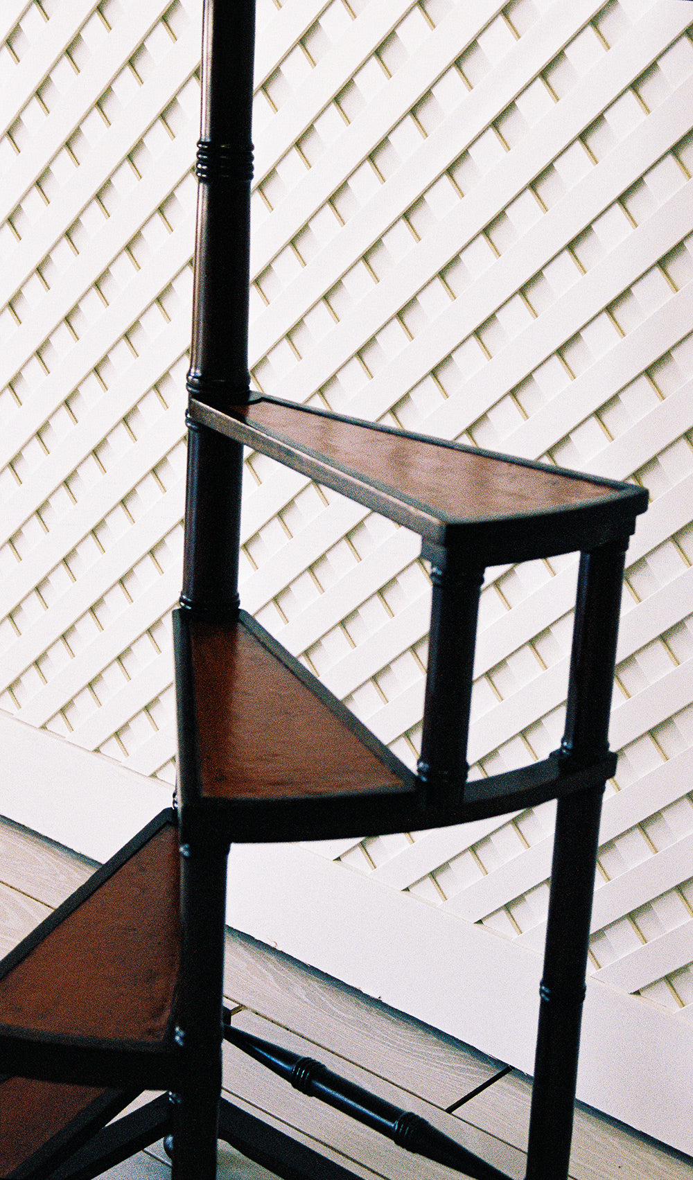 Mahogany spiral library steps with inset leather treads, close view