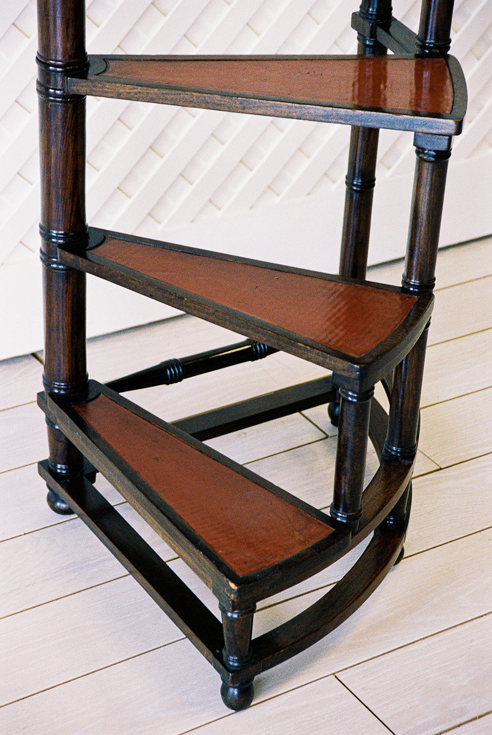 Mahogany spiral library steps with inset leather treads, close view